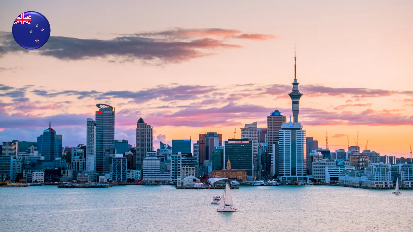 Auckland skyline with the Sky Tower at sunset